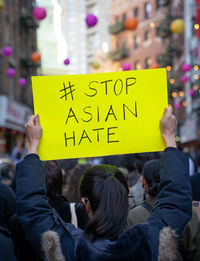 Stop asian hate march, times square to chinatown photographed in new york, ny usa march 21, 2021