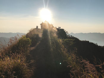 Scenic view of mountains against sky during sunset