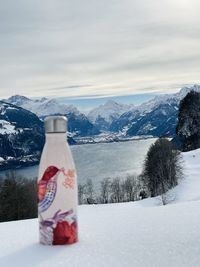Snow covered mountain against sky