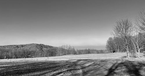 Scenic view of land against clear sky