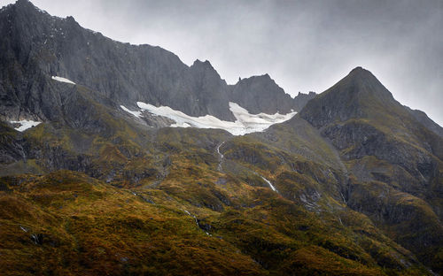 Rising mountains near bjørke, the innermost part of the hjørundfjorden, norway