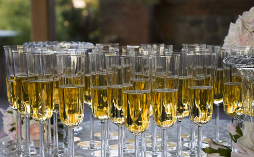 Close-up of wine glasses on table