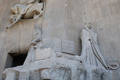 The statues on the outer facade of the basilica of the sagrada familia, barcelona, spain.