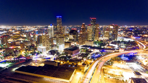 High angle view of illuminated city at night