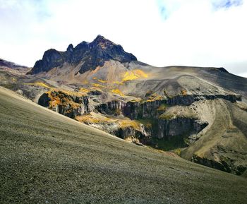 Scenic view of mountains against sky