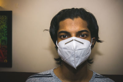 Close-up portrait of a man with mask