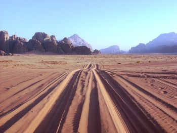 Scenic view of desert against clear sky