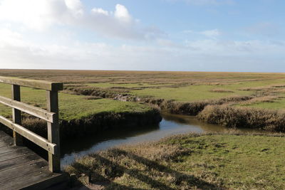 Scenic view of river against sky