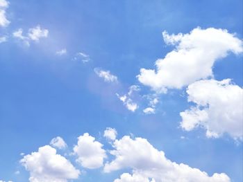 Low angle view of clouds in blue sky