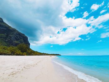 Scenic view of beach against sky