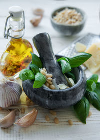 Ingredient for pesto sauce - fresh basil, pine nuts, olive oil and cheese