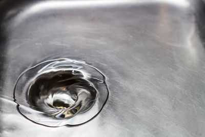 Close-up of water flowing in sink