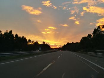 Road against sky during sunset