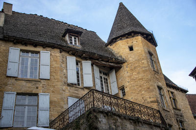 Low angle view of old building against sky