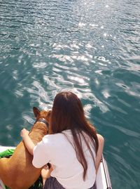 Rear view of woman in sea