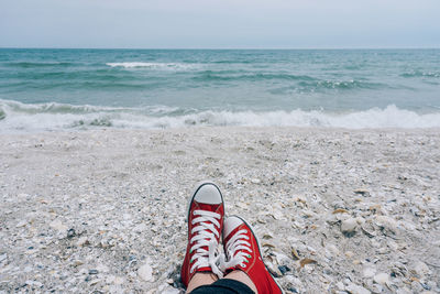 Low section of person on beach