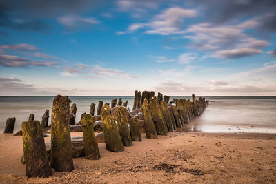 Scenic view of beach against sky