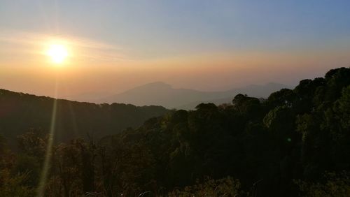 Scenic view of mountains against sky during sunset