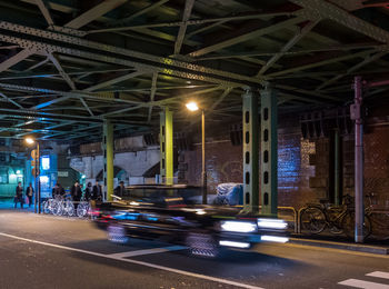 Illuminated street lights at night