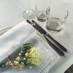 High angle view of flowers on plate at table