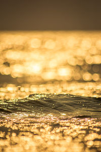 Close-up of pebbles in sea