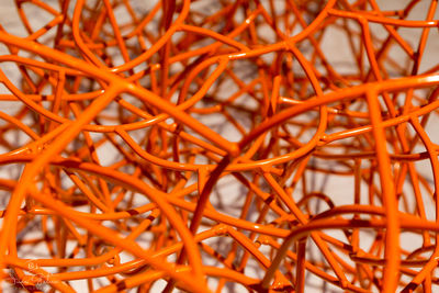 Close up of orange tangled decor