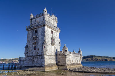 View of historical building against blue sky