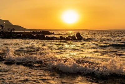 Scenic view of sea against sky during sunset