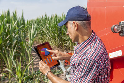 Side view of man working in farm