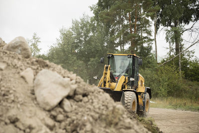 Excavator working at construction site