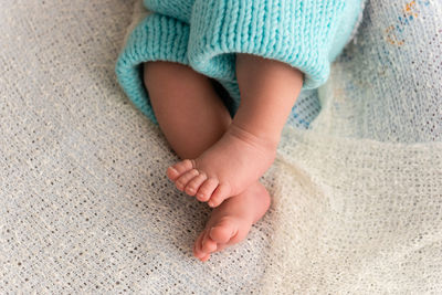 Directly above shot of baby boy on fabric