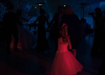 Group of people standing in nightclub