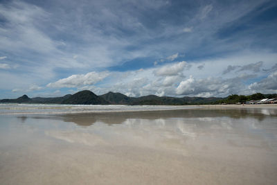 Scenic view of beach against sky