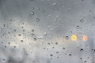 Full frame shot of wet glass during monsoon