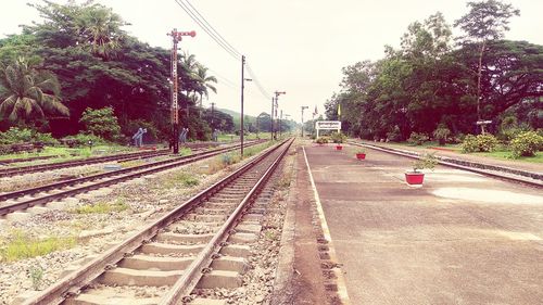 Railway tracks against clear sky