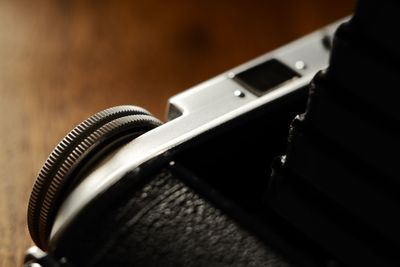 Close-up of camera phone on table