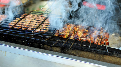 Close-up of fire on barbecue grill