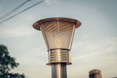 Low angle view of water tower against sky