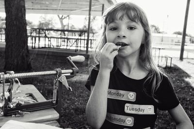 Portrait of boy eating food