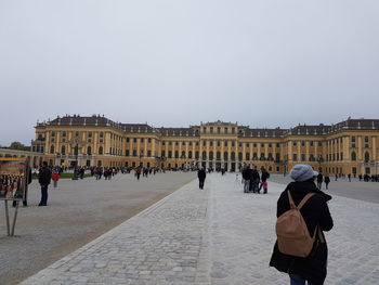 Tourists at town square during winter