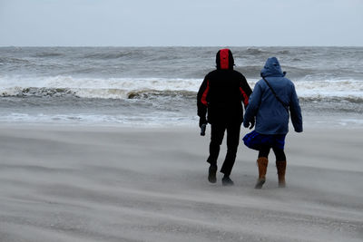 People walking at beach