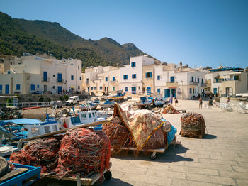 Panoramic view of buildings in city against sky