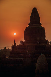 View of temple against sky during sunset