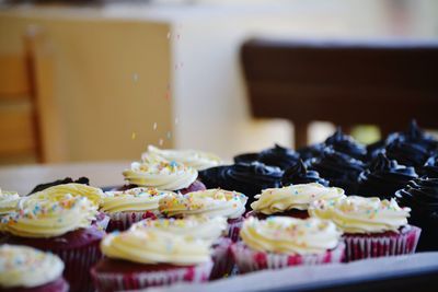 Close-up of cupcakes on table