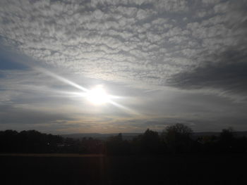 Scenic view of silhouette landscape against sky during sunset