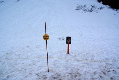 High angle view of snow covered street light