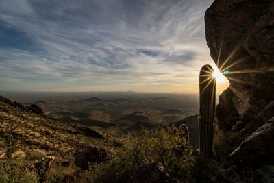 Scenic view of mountains against sky during sunset