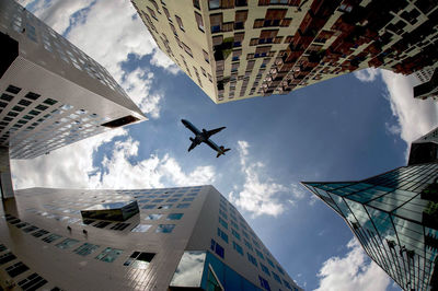 Airplane over architecture