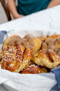 Close-up of hand holding burger