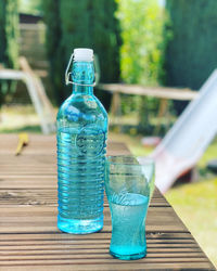 Close-up of glass bottle on table